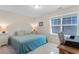Bedroom with a work station, natural light from the window with a view, and a comfy chair at 3185 Viceroy Loop, Little River, SC 29566