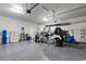 Spacious garage with epoxy flooring featuring ample storage room for parking vehicles and more at 3185 Viceroy Loop, Little River, SC 29566