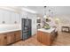 Bright, open kitchen with stainless steel appliances, a large island, and hardwood floors at 3185 Viceroy Loop, Little River, SC 29566