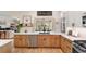 Stylish kitchen featuring stainless steel appliances, custom cabinetry, and an open layout at 3185 Viceroy Loop, Little River, SC 29566