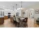 Open kitchen with a large island, modern appliances, and light wood flooring at 3185 Viceroy Loop, Little River, SC 29566