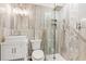 Modern bathroom with a glass enclosed shower, modern vanity, tiled wall, and stylish fixtures at 3597 Sunfish St., Murrells Inlet, SC 29576
