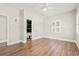 Bright bedroom with hardwood floors and an ensuite bathroom at 3597 Sunfish St., Murrells Inlet, SC 29576