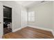 Cozy bedroom featuring hardwood floors and an attached bathroom at 3597 Sunfish St., Murrells Inlet, SC 29576