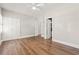 Bedroom with ceiling fan, wood floors, and a walk-in closet at 3597 Sunfish St., Murrells Inlet, SC 29576