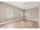 Bright bedroom with multiple windows and hardwood floors at 3597 Sunfish St., Murrells Inlet, SC 29576