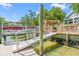 View of dock with a boat lift featuring a covered gazebo at 3597 Sunfish St., Murrells Inlet, SC 29576