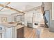 Well-equipped kitchen featuring granite countertops, stainless steel appliances, and custom cabinetry at 3597 Sunfish St., Murrells Inlet, SC 29576