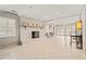 Large living room with brick fireplace and views to the outside at 3597 Sunfish St., Murrells Inlet, SC 29576