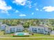 Aerial view of community with pool at 3700 Golf Colony Lane # 25-D, Little River, SC 29566