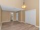 Spacious bedroom with wood floors and double door closet at 3700 Golf Colony Lane # 25-D, Little River, SC 29566