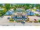Scenic aerial view of the well-maintained condo community with lush landscaping and ample parking at 3700 Golf Colony Lane # 2-J, Little River, SC 29566