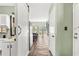Interior view of the home with a spiral staircase, a kitchen, and dining area at 3700 Golf Colony Lane # 2-J, Little River, SC 29566