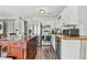 Well-equipped kitchen features stainless steel appliances, butcher block counters, and white cabinets at 3700 Golf Colony Lane # 2-J, Little River, SC 29566