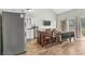 Bright and open living area features kitchen access and ample natural light at 3700 Golf Colony Lane # 2-J, Little River, SC 29566