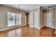 Inviting dining area with hardwood flooring, large window, and contemporary chandelier lighting at 391 William Nobles Rd., Aynor, SC 29511