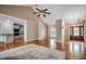 Open-concept living area showcasing hardwood floors, contemporary lighting, and an open flow at 391 William Nobles Rd., Aynor, SC 29511