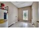 Functional utility room features tile floors, a window, and a water heater at 391 William Nobles Rd., Aynor, SC 29511