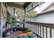 Inviting covered balcony featuring plants, a bird bath, and an open view of the neighborhood at 404 72Nd Ave. N # 301, Myrtle Beach, SC 29572
