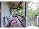 The expansive porch area features comfortable seating, hanging plants, and serene views, perfect for outdoor relaxation at 404 72Nd Ave. N # 301, Myrtle Beach, SC 29572