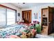 Cozy bedroom featuring a colorful quilt, closet, and an open doorway to another room at 404 72Nd Ave. N # 301, Myrtle Beach, SC 29572