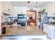 Bright kitchen featuring granite countertops, white cabinetry, and stainless steel appliances at 404 72Nd Ave. N # 301, Myrtle Beach, SC 29572