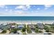 Beach view from property showing the beach, ocean, and surrounding neighborhood at 412 Middleton Dr., Pawleys Island, SC 29585