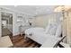 Bright bedroom with hardwood floors, a neutral color palette and lots of natural light at 412 Middleton Dr., Pawleys Island, SC 29585