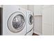 Convenient laundry room featuring a washer and dryer with ample cabinet space at 412 Middleton Dr., Pawleys Island, SC 29585