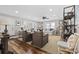 Bright and spacious living room featuring hardwood floors, neutral tones, and multiple seating areas at 412 Middleton Dr., Pawleys Island, SC 29585