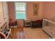 pink bedroom with crib and twin sized bed. Large sunny window and fun toys at 429 Oakham Dr., Conway, SC 29526