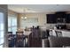 Dining space has a table, chandelier, a view of the kitchen, and plenty of natural light at 429 Oakham Dr., Conway, SC 29526