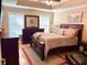 Relaxing primary bedroom features natural lighting, a tray ceiling, and beautiful decor at 429 Oakham Dr., Conway, SC 29526