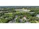 Aerial view of property, showcasing lush green trees and close proximity to a highway at 4450 Little River Inn Ln. # 601, Little River, SC 29566