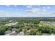 Aerial view of the community, showing lush green trees and close proximity to the ocean at 4450 Little River Inn Ln. # 601, Little River, SC 29566