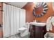 Charming bathroom with a dark wood vanity, a large mirror, and a shower with a curtain at 4450 Little River Inn Ln. # 601, Little River, SC 29566