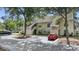 Well-kept two-story townhouse with assigned parking and mature trees in a residential neighborhood at 4450 Little River Inn Ln. # 601, Little River, SC 29566