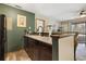 Well-maintained kitchen featuring solid-surface countertops, a kitchen sink, and a coffee station at 4450 Little River Inn Ln. # 601, Little River, SC 29566