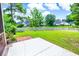 The expansive backyard overlooks neighboring homes separated by a white picket fence at 4499 Firethorne Dr., Murrells Inlet, SC 29576