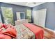 Comfortable bedroom with hardwood floors, and ample natural light at 4499 Firethorne Dr., Murrells Inlet, SC 29576
