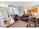 Spacious living room and kitchen with hardwood floors and ample natural light at 4499 Firethorne Dr., Murrells Inlet, SC 29576