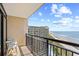 Balcony with ocean view, beach, railing and patio furniture at 4800 S Ocean Blvd. # 1524, North Myrtle Beach, SC 29582