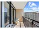 Condo balcony with a view of the neighboring building and blue sky at 4800 S Ocean Blvd. # 1524, North Myrtle Beach, SC 29582