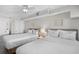 Bright bedroom featuring two queen beds, soft lighting, and neutral decor at 4800 S Ocean Blvd. # 1524, North Myrtle Beach, SC 29582