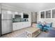 Cozy kitchen with the inviting living area features comfortable seating and modern appliances, perfect for relaxing and entertaining at 4800 S Ocean Blvd. # 1524, North Myrtle Beach, SC 29582