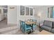Charming living area with a dining space offers cozy seating and bright natural light, perfect for relaxation at 4800 S Ocean Blvd. # 1524, North Myrtle Beach, SC 29582