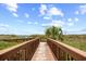 Wooden walkway leading to the beach and sparkling ocean at 4800 S Ocean Blvd. # 1524, North Myrtle Beach, SC 29582