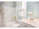 This bathroom features a shower and tub combo with a white vanity at 4868 Dahlia Ct. # 202, Myrtle Beach, SC 29577