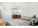 Bedroom with twin beds, wood dresser, and a mirror closet at 4868 Dahlia Ct. # 202, Myrtle Beach, SC 29577