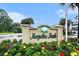 Magnolia North entrance sign surrounded by colorful flowers at 4868 Dahlia Ct. # 202, Myrtle Beach, SC 29577